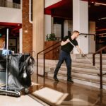 Toolflex professional - A man cleaning stairs in a schoolvestibule